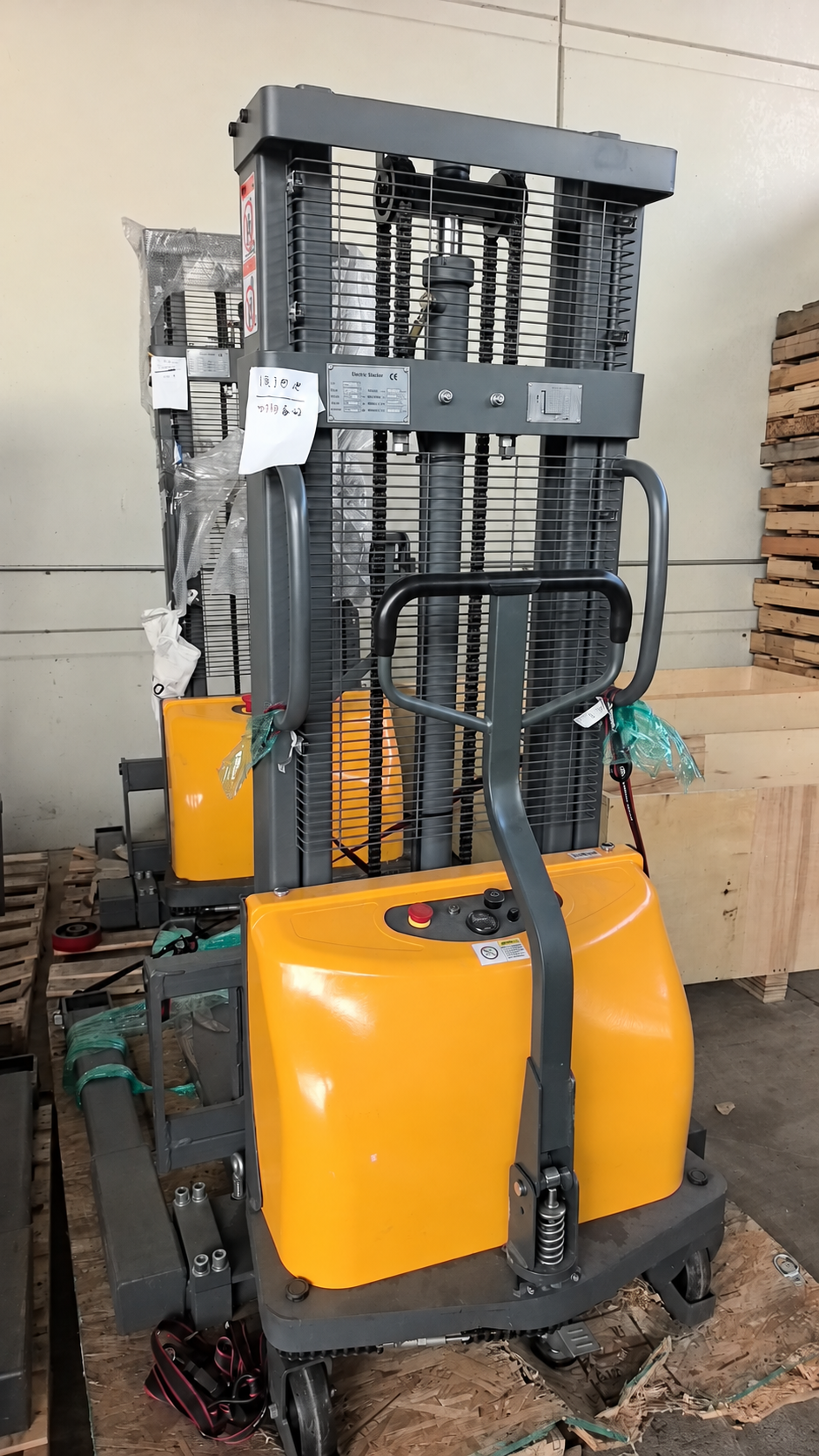 Pre-owned Premium Used CTD10B-III-98–2,200 lb Semi-Electric Stacker, 98" Lift, Straddle Legs & Adjustable Forks-20030091