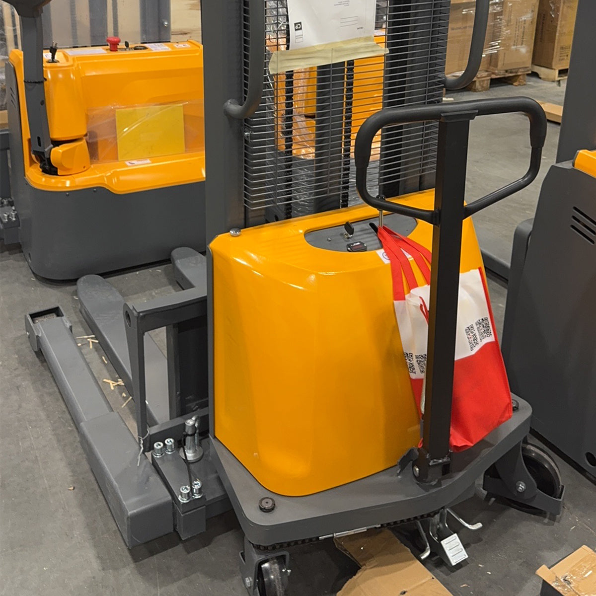 Pre-owned CTD15BE-118 – 3,300 lb Semi-Electric Stacker, 118" Lift, Straddle Legs & Adjustable Forks