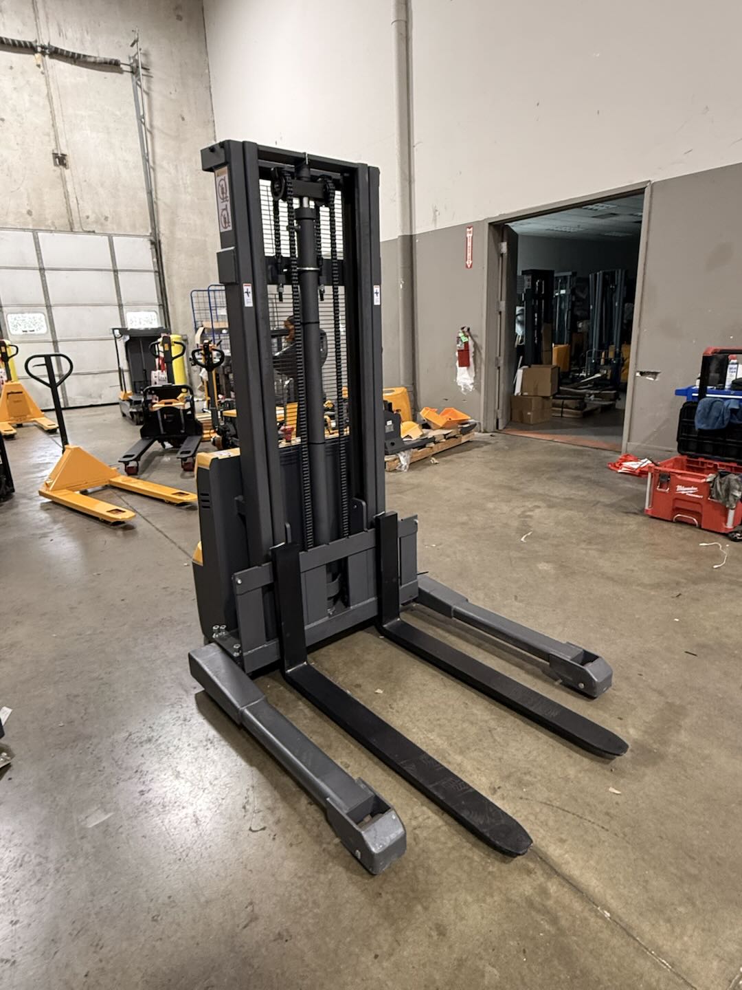 Pre-owned Premium Used CTD10R-E-98 – 2,200 lb Electric Stacker, 98" Lift, Straddle Legs & Adjustable Forks-21060100
