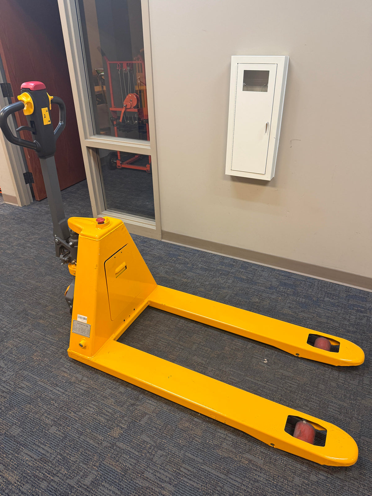 Pre-owned CBD15 3,300 lb Electric Pallet Jack, Compact Lithium Model, 48"x27" Forks