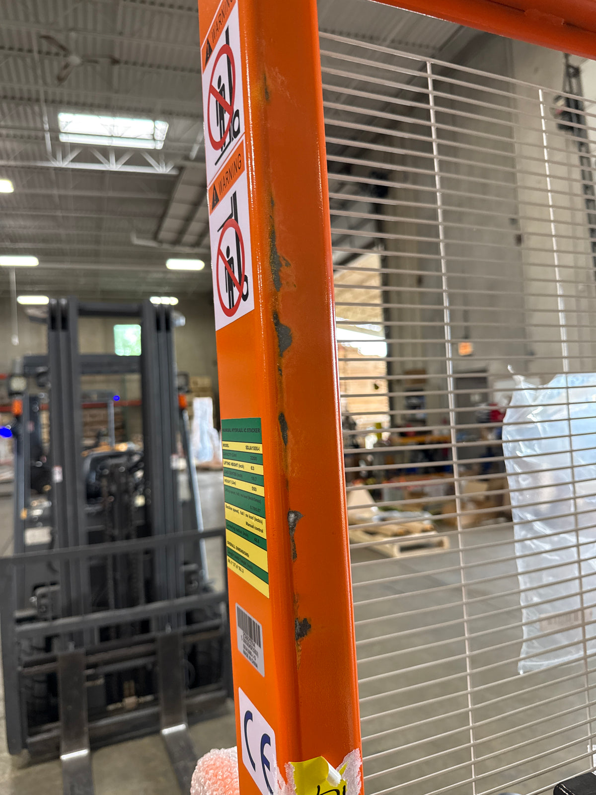 Pre-owned Premium Used SDJA1000-I-O–2200lbs Manual Pallet Stacker 2200 lbs Capacity 63" Lift Fixed Legs-250025594
