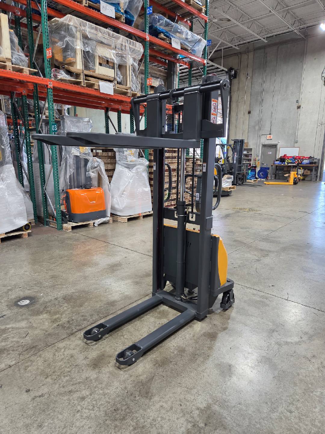 Pre-owned Regular Used CDD10B-III-63–2,200 lb Semi-Electric Stacker, 63" Lift, Fixed Legs & Adjustable Forks-20070650