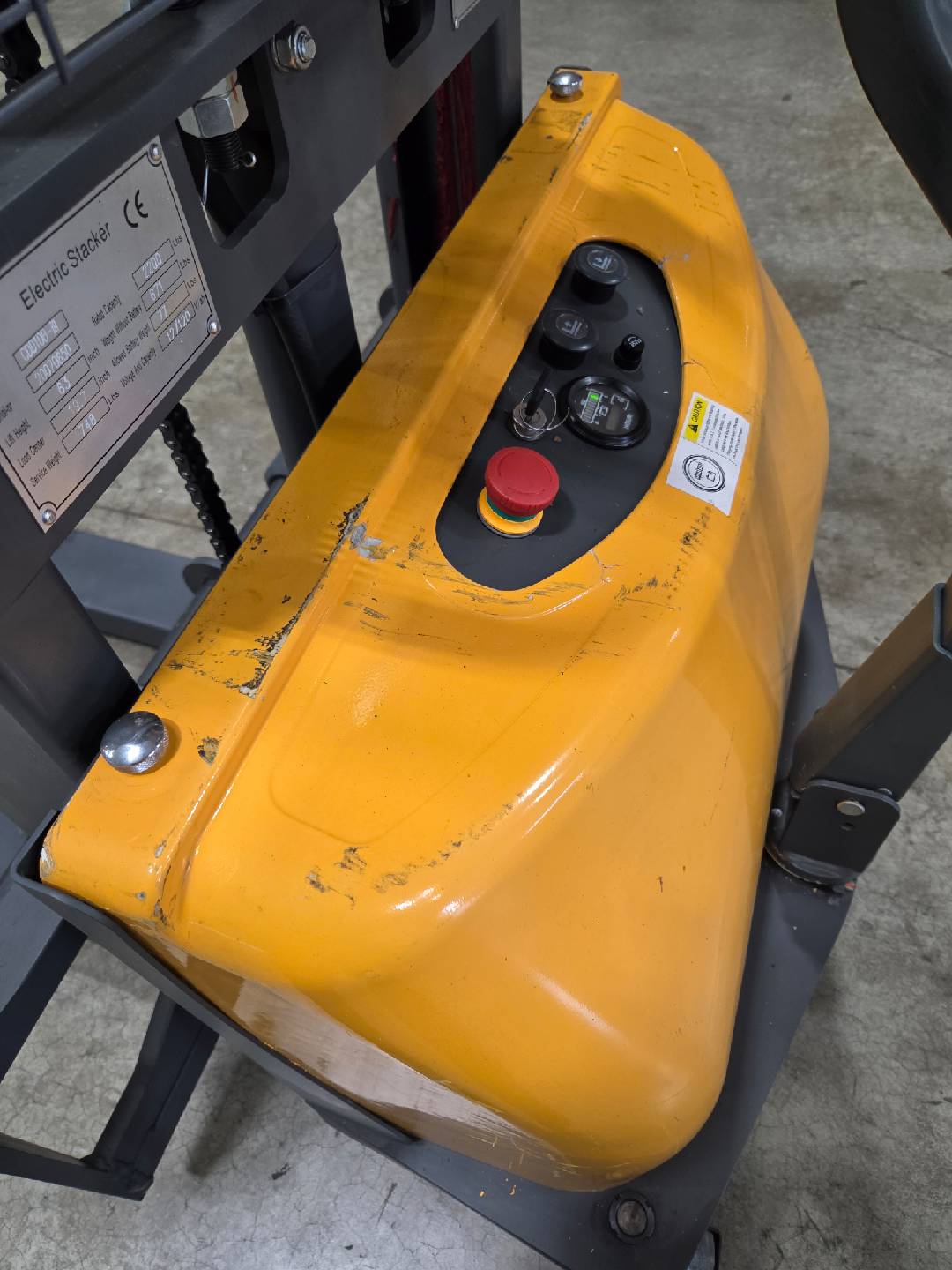 Pre-owned Regular Used CDD10B-III-63–2,200 lb Semi-Electric Stacker, 63" Lift, Fixed Legs & Adjustable Forks-20070650