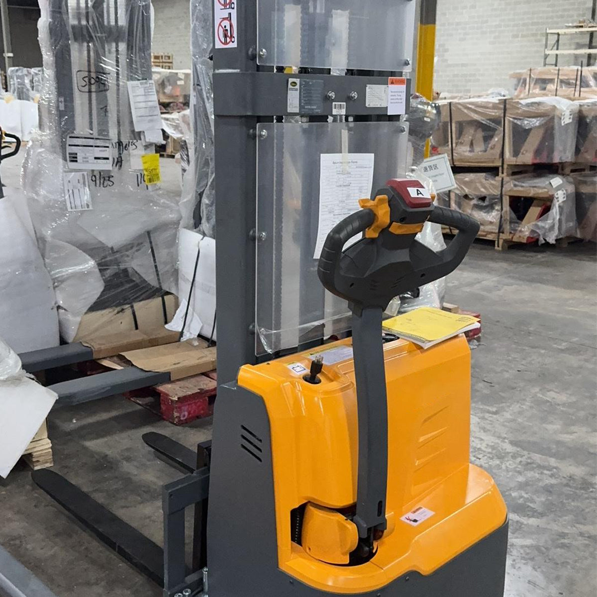 Pre-owned CTD15R-E-98 – 3,300 lb Electric Stacker, 98" Lift Height, Straddle Legs