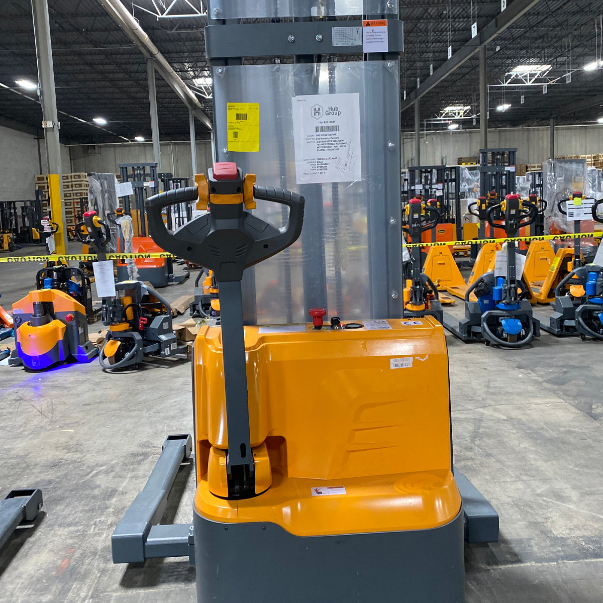 Pre-owned CTD12R-E-19-118 – 2,640 lb Electric Stacker, 118" Lift Height, Straddle Legs