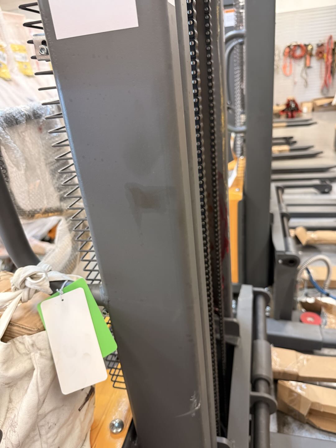 Pre-owned Premium Used CTD10B-III-98–2,200 lb Semi-Electric Stacker, 98" Lift, Straddle Legs & Adjustable Forks-21060112