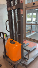 Pre-owned CTD15BE-118 – 3,300 lb Semi-Electric Stacker, 118" Lift, Straddle Legs & Adjustable Forks