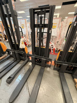 Pre-owned Premium Used CDD10B-III-98–2,200 lb Semi-Electric Stacker, 98" Lift, Fixed Legs & Adjustable Forks-20040382