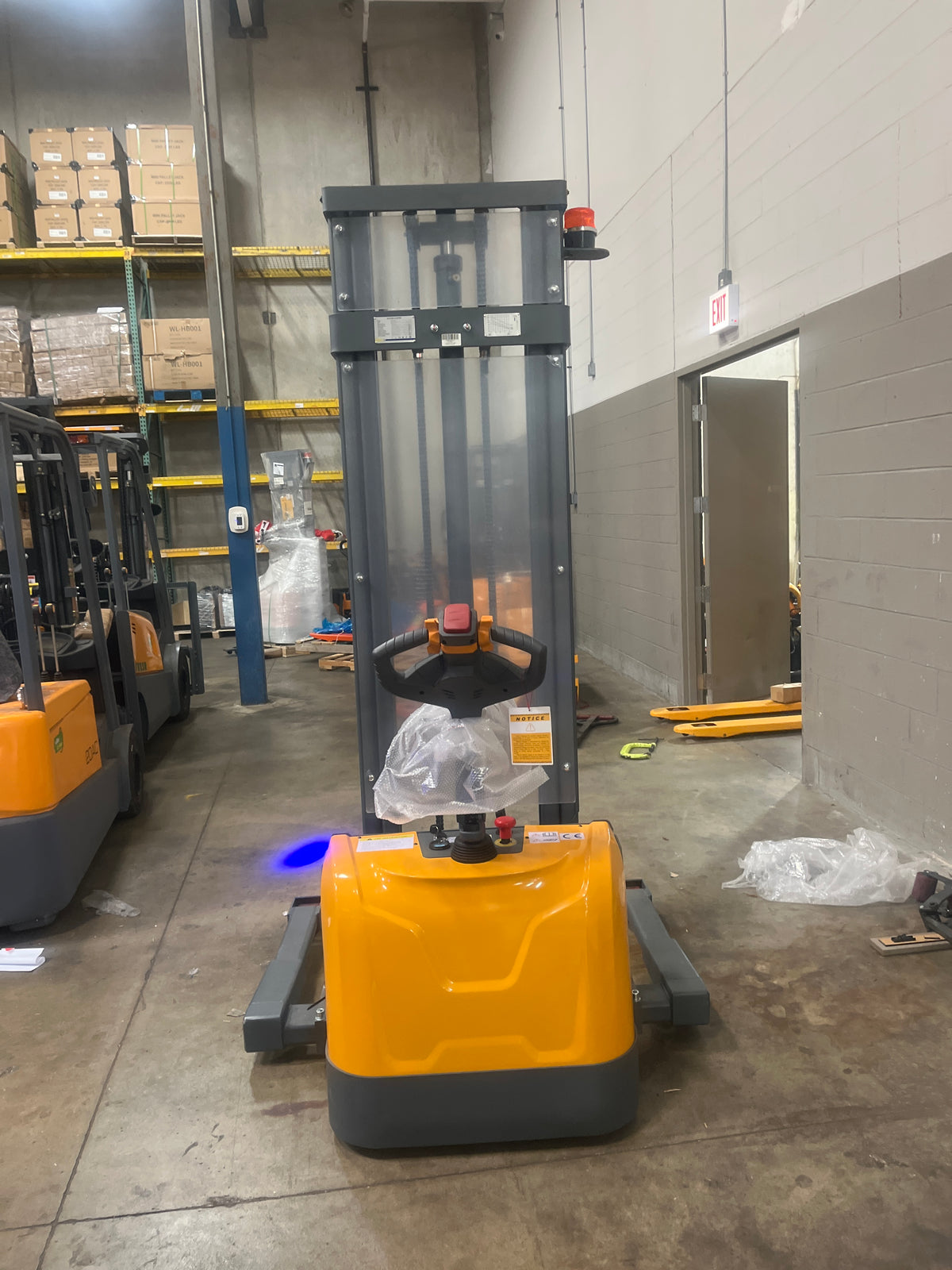 Pre-owned CTD15R-EN-138-3,300 lb Capacity 138" Lift Compact Electric Stacker Adjustable Forks