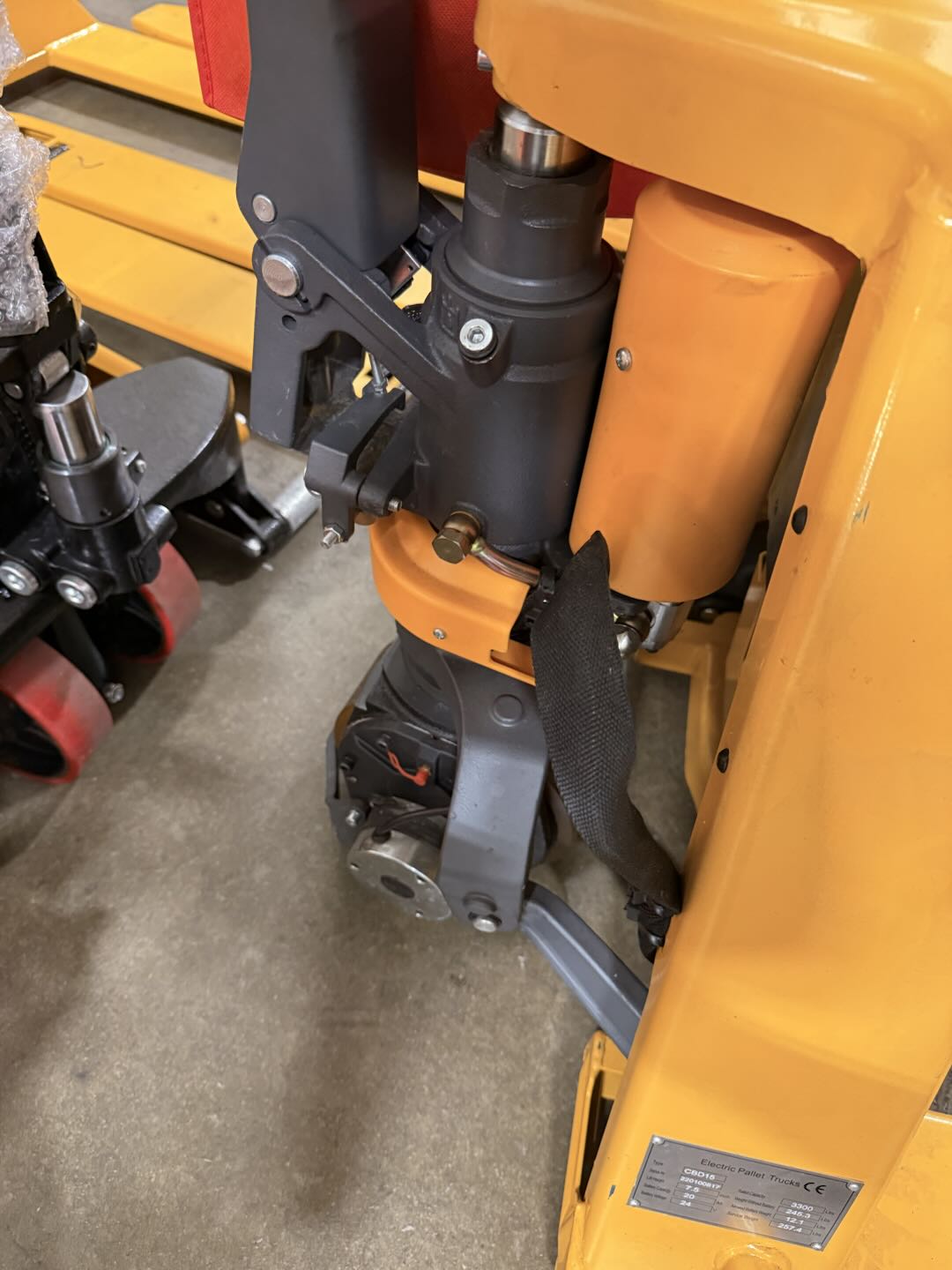Pre-owned CBD15 3,300 lb Electric Pallet Jack, Compact Lithium Model, 48"x27" Forks