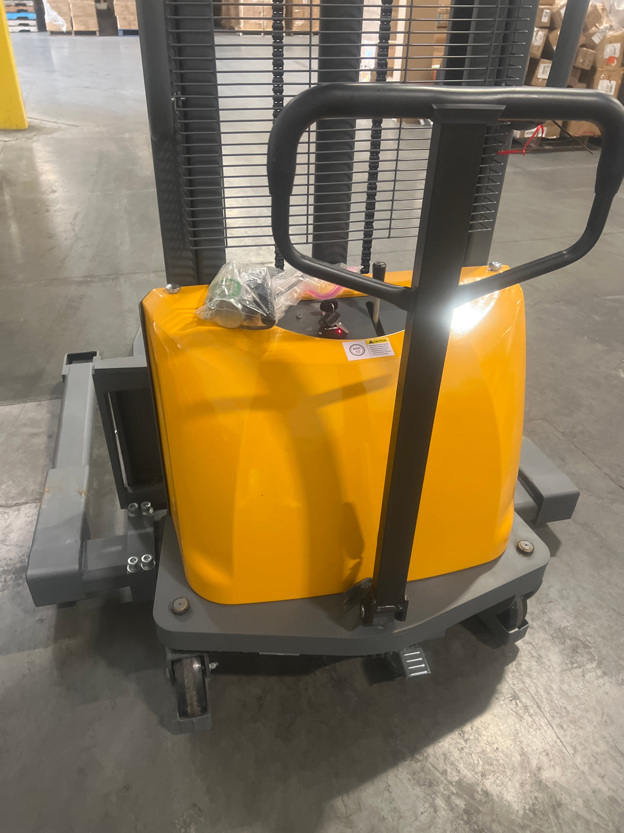 Pre-owned CTD15BE-98 – 3,300 lb Semi-Electric Stacker, 98" Lift, Straddle Legs & Adjustable Forks