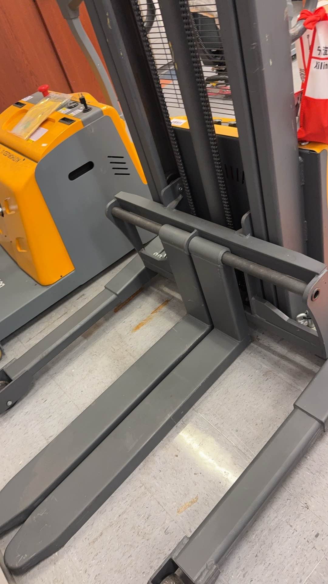 Pre-owned Premium Used CTD10B-III-98–2,200 lb Semi-Electric Stacker, 98" Lift, Straddle Legs & Adjustable Forks-21060116