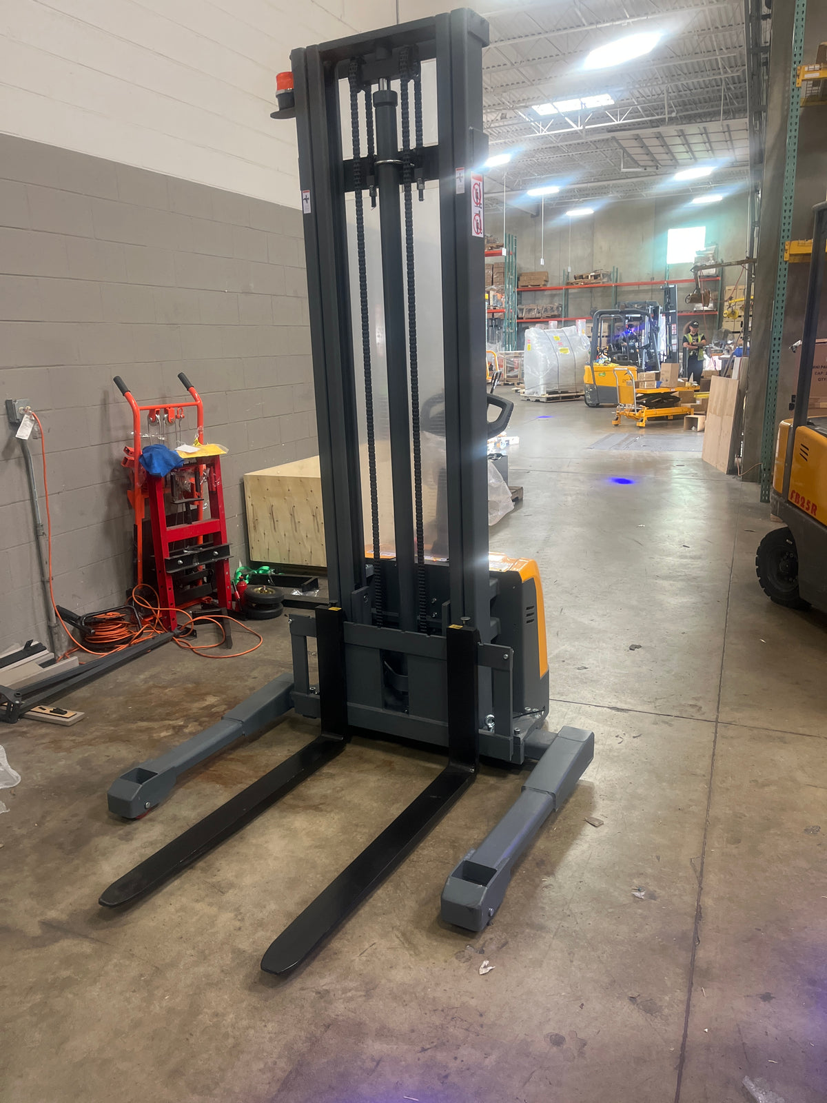Pre-owned CTD15R-EN-138-3,300 lb Capacity 138" Lift Compact Electric Stacker Adjustable Forks