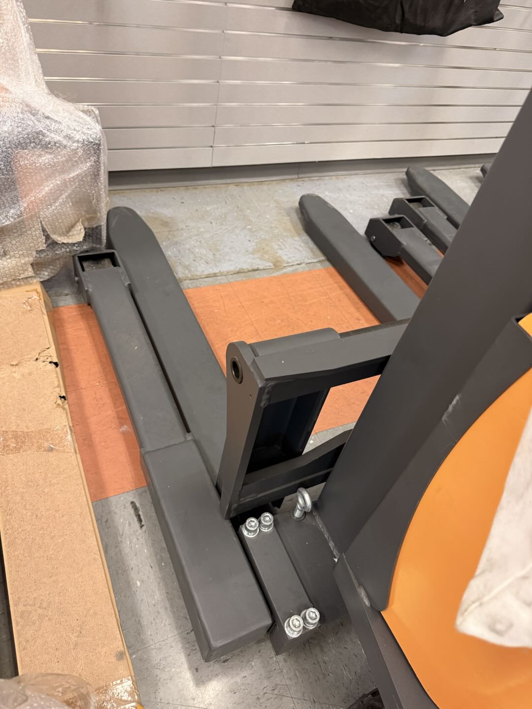 Pre-owned Premium Used CTD10B-III-118–2,200 lb Semi-Electric Stacker, 118" Lift, Straddle Legs & Adjustable Forks-20090443