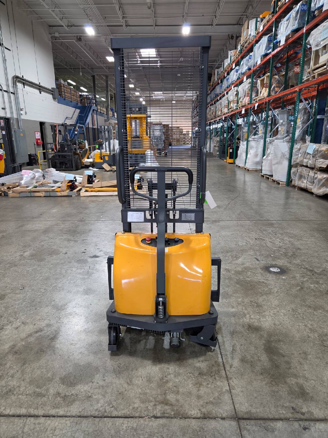 Pre-owned Regular Used CDD10B-III-63–2,200 lb Semi-Electric Stacker, 63" Lift, Fixed Legs & Adjustable Forks-20070650